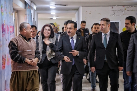 دابەشکردنی جل و بەرگ و دیاری بەسەر 103 قوتابی بیر کول و داون