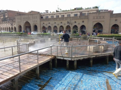 Washing and cleaning the streets and fountains of the city park