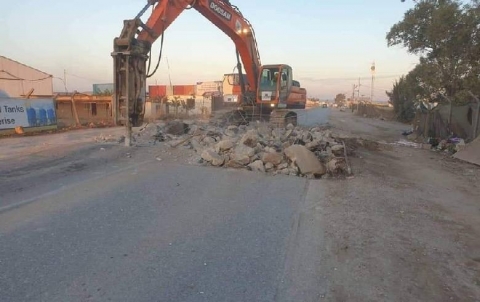 Paving and repairing potholes and failures and removing concrete speed bump of Gazna main road